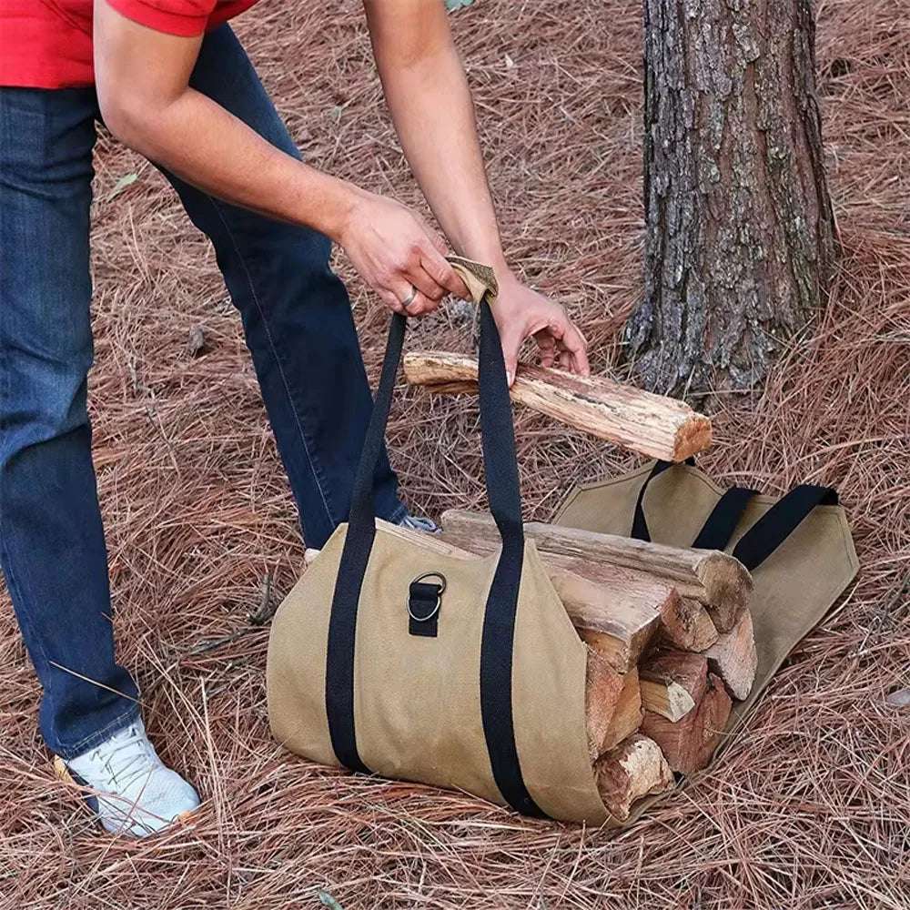 Canvas firewood carrier with sturdy handles being loaded by person outdoors camping and hiking gear UAE